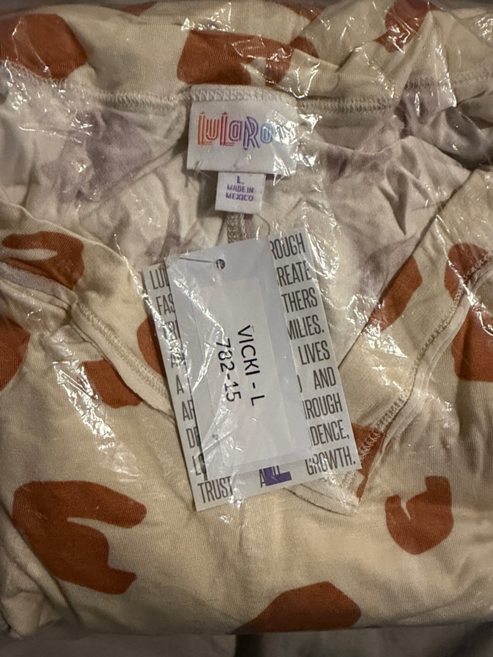 LuLaRoe Cream Top with Rust Spot Print